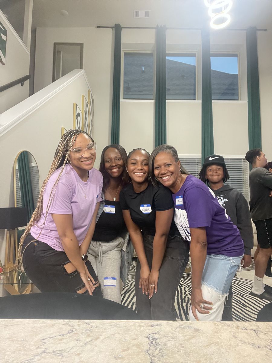 Women from a Kingdom Kouples marriage small group in Houston smiling together in name tags